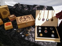 Wood burned boxes, Cameo rings, and amethyst topped with pewter figures.